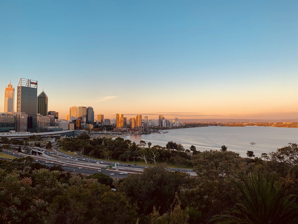 The Perth skyline across the Swan River at sunset